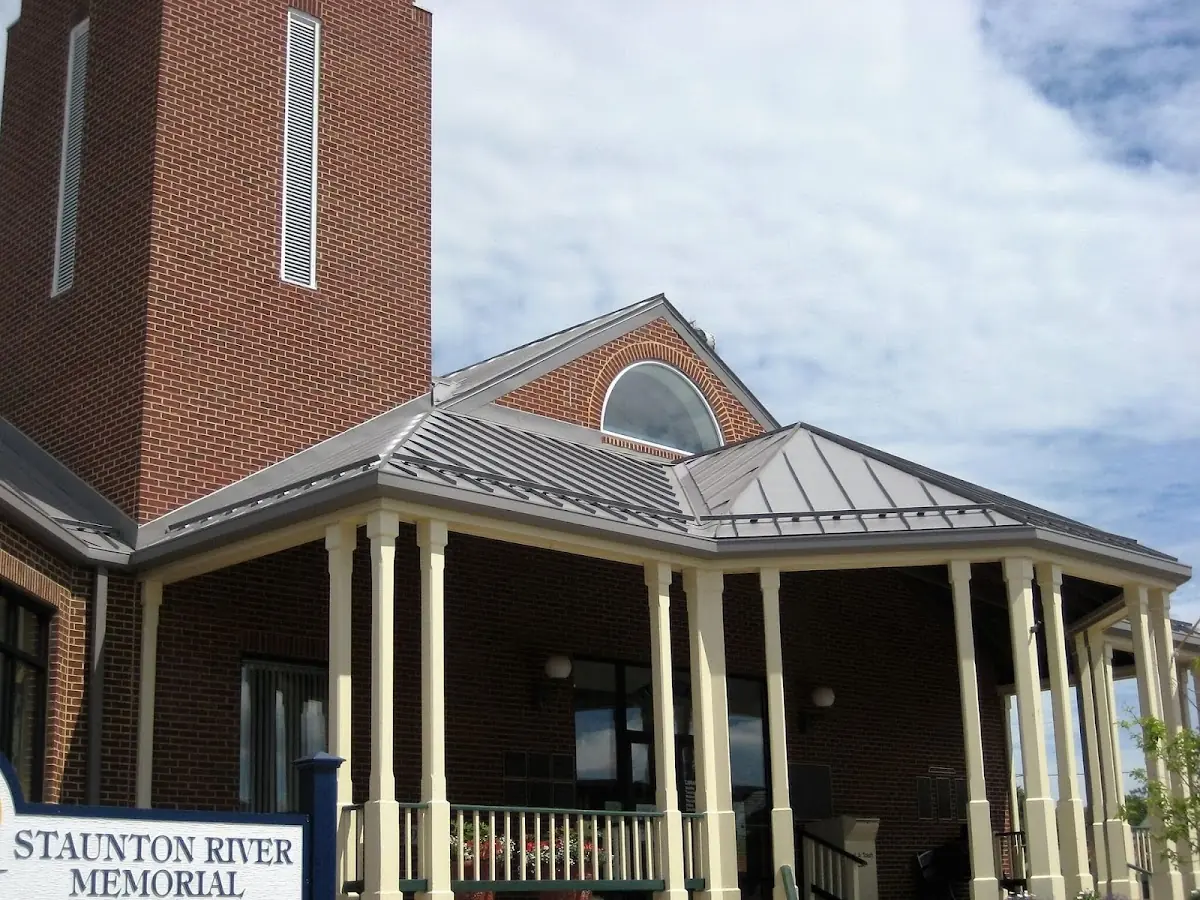 Skilled roofing craftsmen working on a residential roof in Hynesboro
